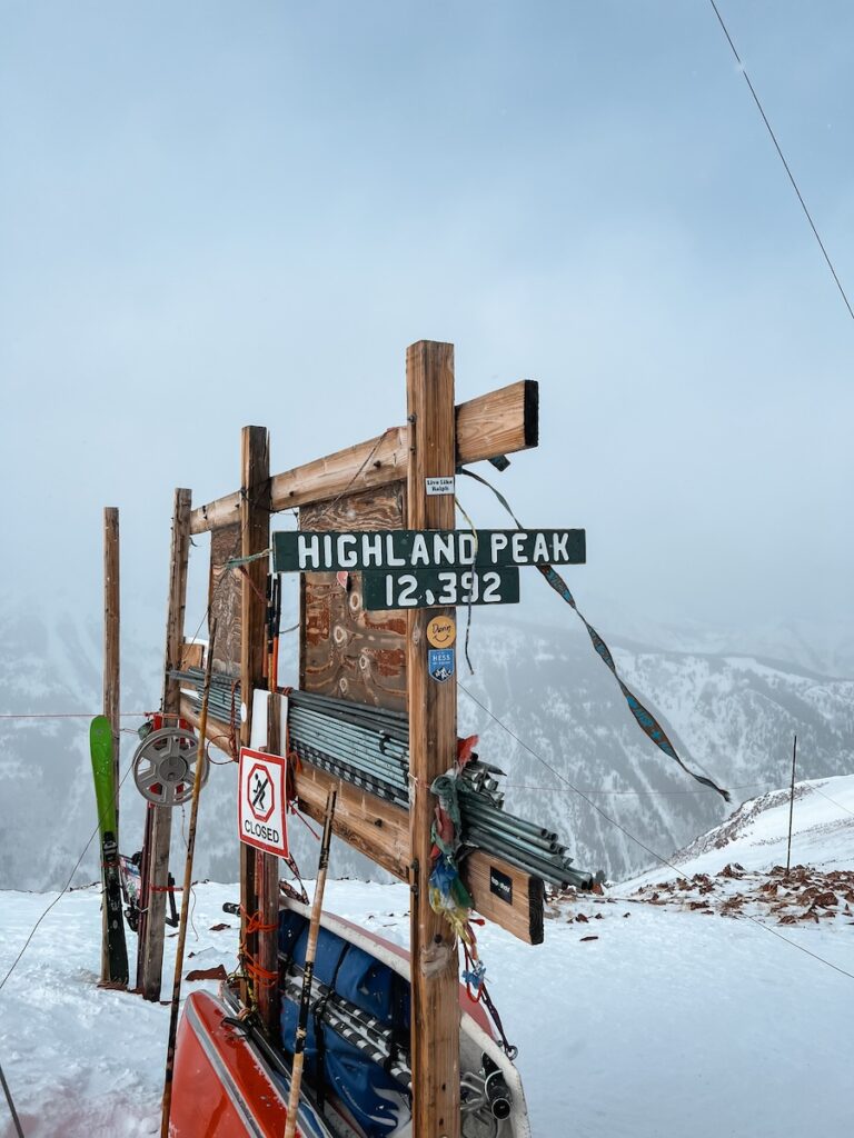 Highland Peak in Aspen with fog and clouds in the distance. 