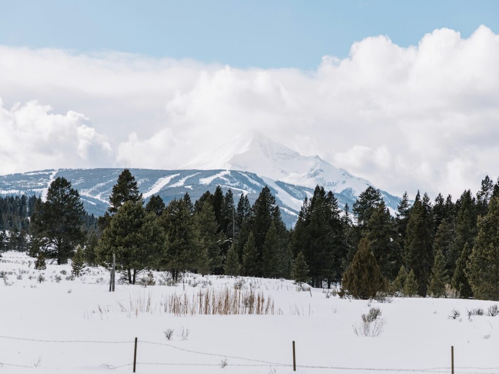 Big Sky Ski Resort from a distance on a cloudy day.