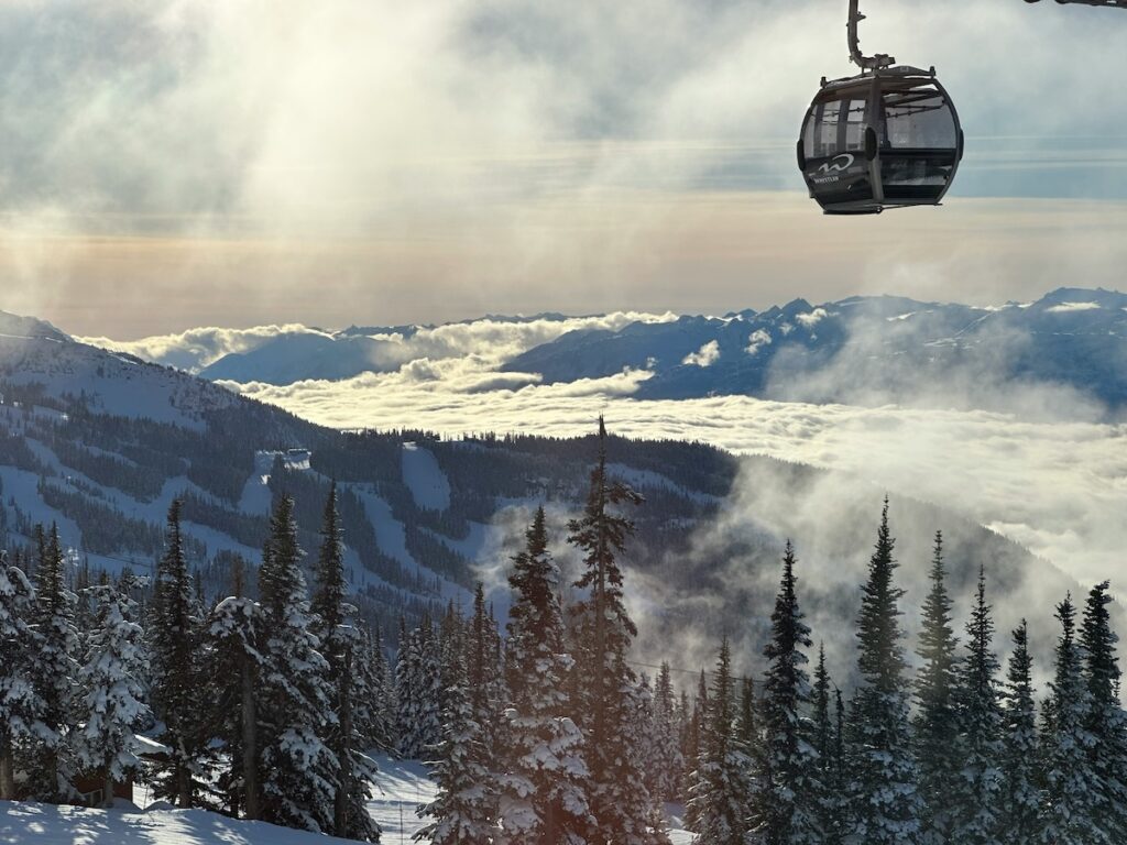 The gondola at Whistler Blackcomb on a partially cloudy day.