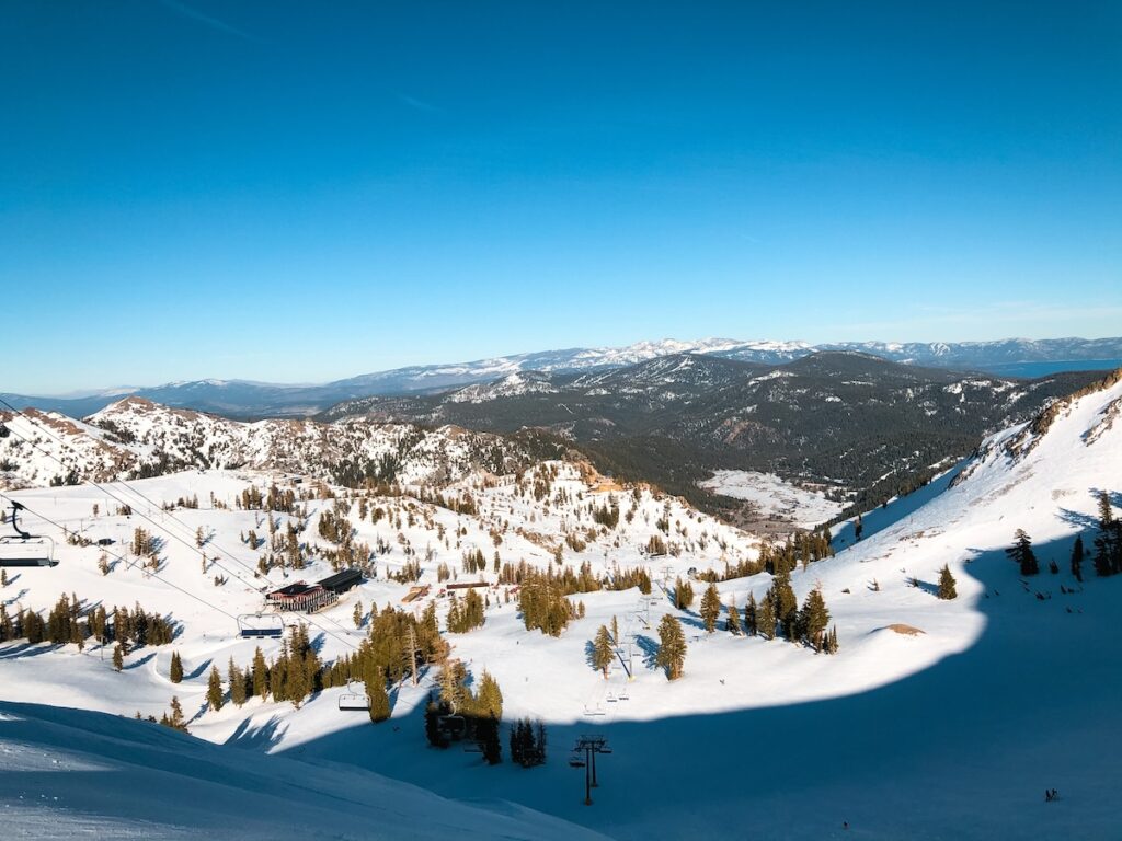 The ski slopes at Palisades Tahoe on a clear bluebird day.