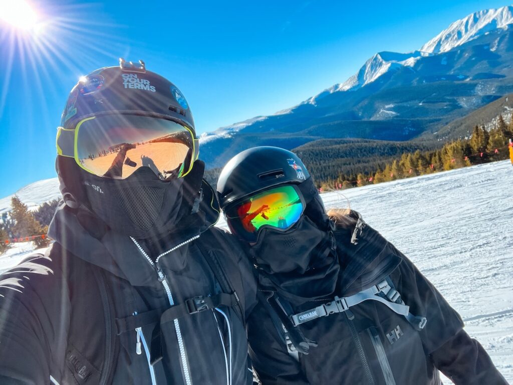 Abby and Sam skiing at Breck on a bluebird day.