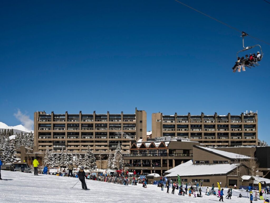 Beaver Run Resort with countless skiers outside on the slopes.