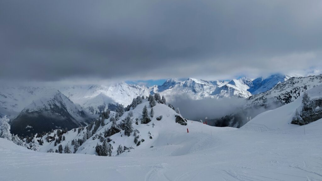 Partially cloudy views of the mountains at Les Arcs in France.