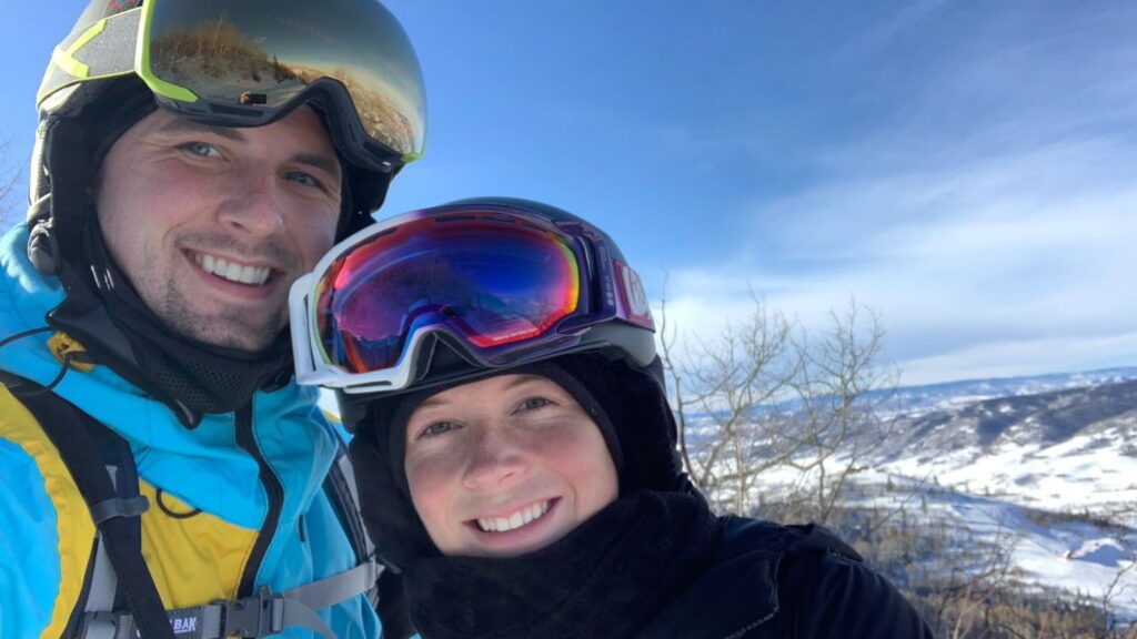 Abby and Sam smiling while skiing and snowboarding in the Steamboat Springs area of Colorado.