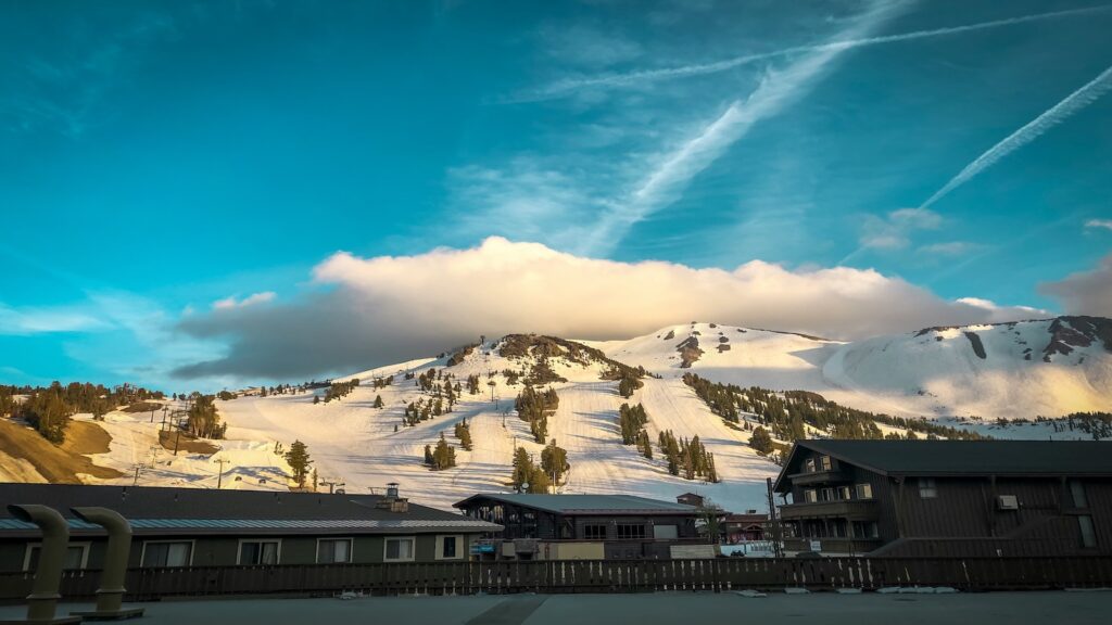 Ski slopes at Mammoth Mountain with blue skies.