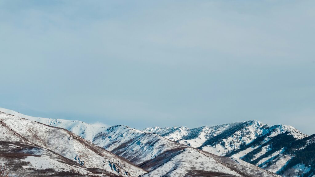 Snow-capped mountains surrounding Ogden.