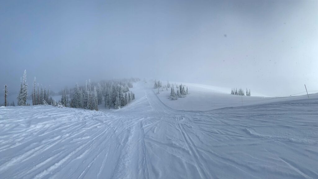 Fresh tracks at Powder Mountain on a cloudy day.