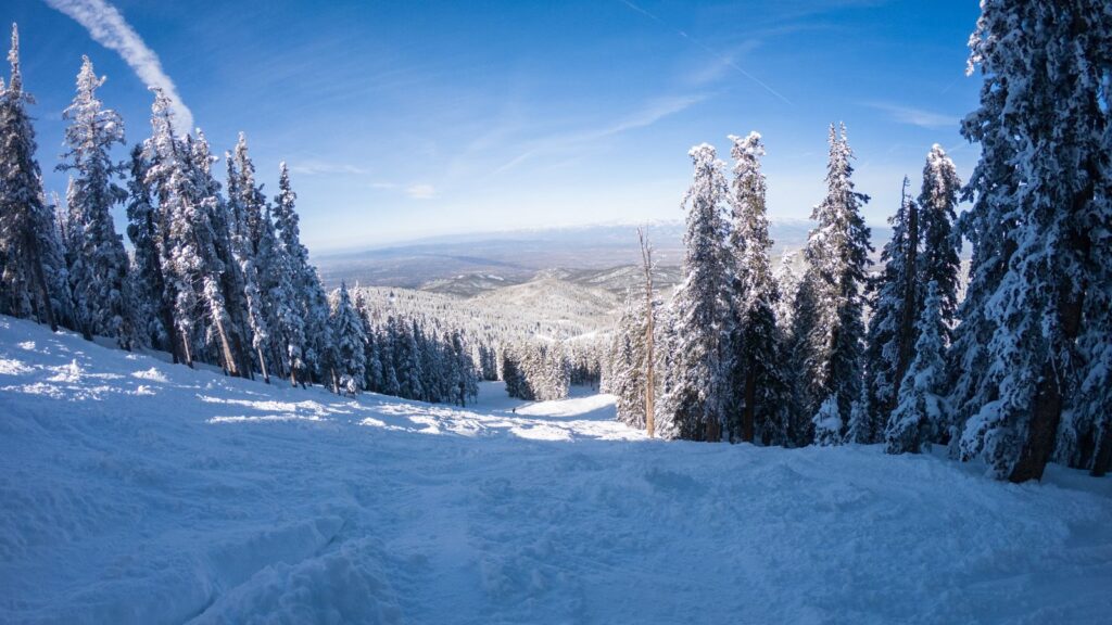 An empty snow covered ski slope in Santa Fe.