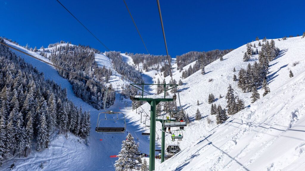 A chair lift at Sun Valley on a bluebird day.