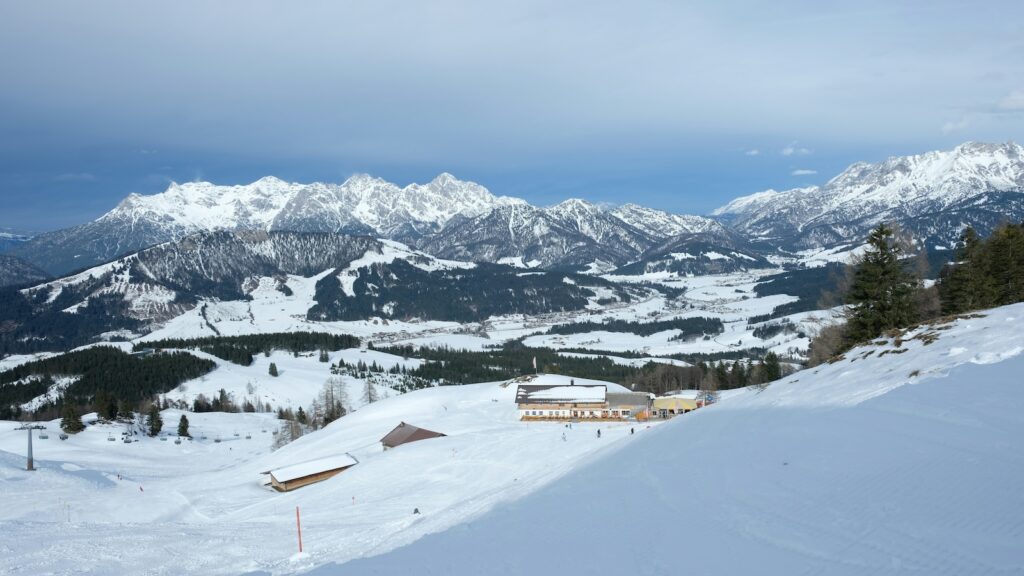 Ski slopes and mountains views with grey skies above at Saalbach.