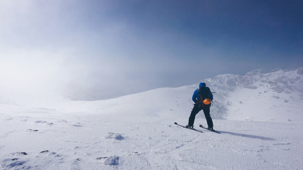 A skier on a grey day.